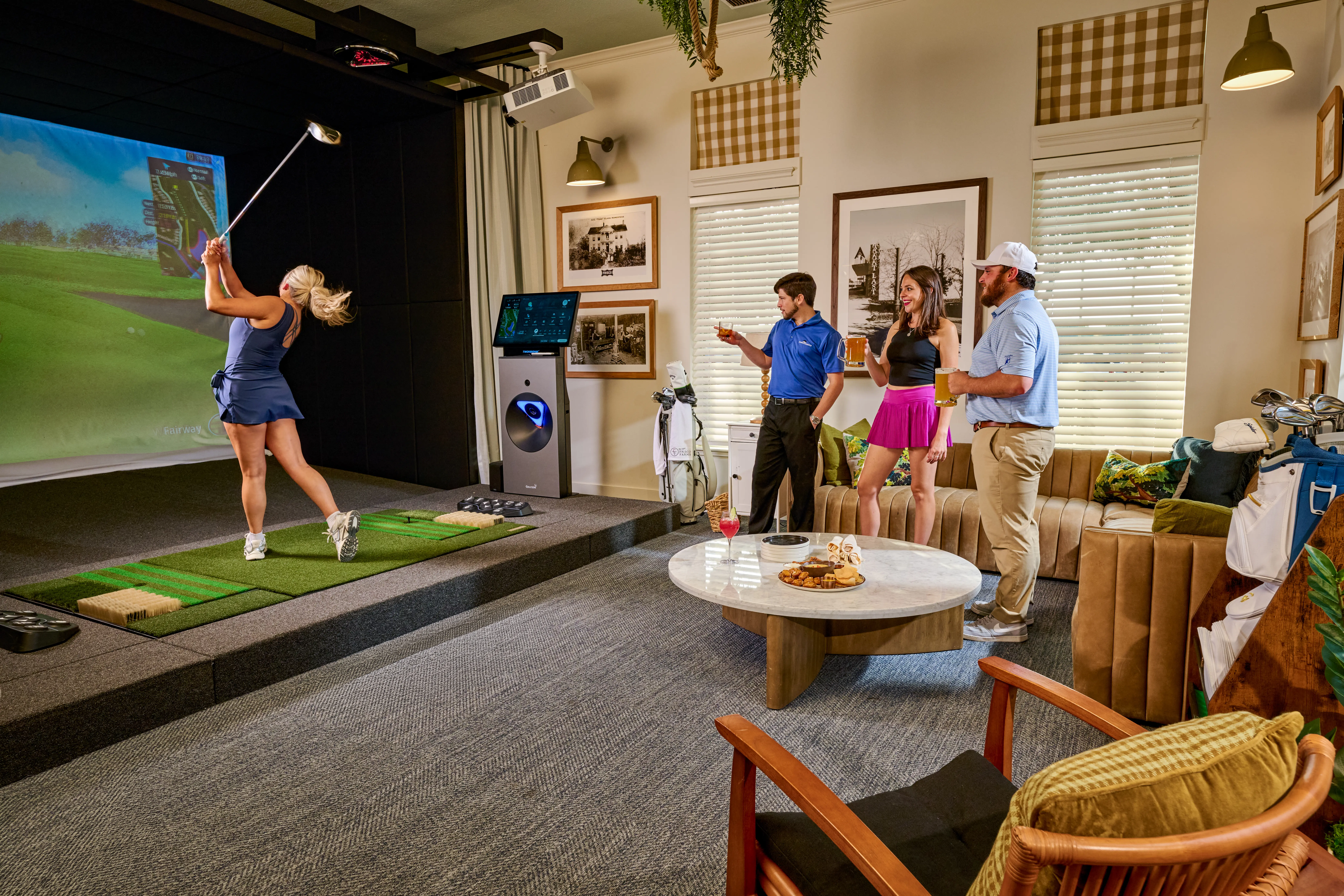 Frisco Farms GC Girl hitting shots in the golf simulator